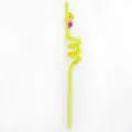 Close-up detail of the creative curly plastic straw featuring a cute cartoon mermaid topper. - Yellow