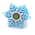 Detailed closeup of children soft rubber snowflake ring, cute Christmas festival toy jewelry. - Snowflake Style