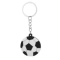 Klassischer schwarz-weisser Fussball-Schluesselanh. aus PVC-Gummi mit stabilem Metallring. - Fußball Stil