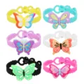 Buntes Schmetterling Silikon Armband für Kinder, PVC Cartoon Insekt Anhänger verstellbarer Schmuck - Zufälliger Schmetterlingsarmband-Stil