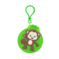 Detailed view of the cute green mini cartoon monkey folding hair brush and compact mirror. - Monkey Mirror Comb