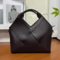 Dark brown woven leather handbag, large capacity stylish tote bag for women daily commute. - Brown