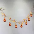 Artificial gourd vine hanging decoration with autumn leaves for home decor and party styling. - Autumn Color