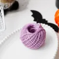 Purple jute twine roll detail for DIY crafts, gift wrapping, and rustic party decorations. - Purple