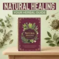 Detail view of the natural healing handbook on a wooden desk with botanical decor. - Gold Coil