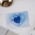 Gedetailleerd overzicht van blauwe hart wenskaart voor vaderdag, ideaal voor geschenken. - 50 Vellen / Vaderdag Hart Smiley Gezicht