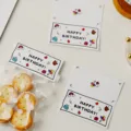 Dettaglio di confezione con cartolina d'auguri di compleanno, ideale per dolci e regali. - Bianco Happy / 50 Pezzi