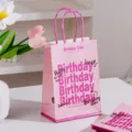 Pink paper gift bag with birthday theme handles for party favors packaging present wrapping. - Pink Gift Bag / 15*21*8cm