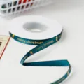 Dark green Christmas ribbon detail, gold stamping merry christmas text for gift wrapping. - Green
