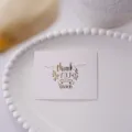Biglietto di ringraziamento minimalista dorato per regali festivi e decorazioni commerciali. - Stile Thank You