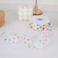Buntes, transparentes Pünktchen-Geschenkband auf Rolle für Geschenkverpackung und Deko. - Bunte Punkte