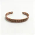 Copper magnetic bracelet detail shot showing Greek key pattern and inner strong magnets. - Pure Copper 6 Magnets 8mm