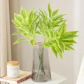 Artificial Dracaena plant in glass vase for indoor home decor, elegant green foliage display. - Single Lily Bamboo - Yellow Edge