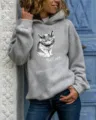 Casual grey long sleeve hooded sweatshirt featuring an artistic cat graphic and quote. - Gray