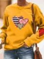 Casual women's yellow long sleeve sweatshirt with heart print and cute elbow patches. - S / Tops / Yellow