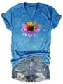 Casual blue V-neck short sleeve t-shirt featuring colorful puzzle sunflower graphic detail. - S / Tops / Blue