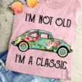 Women vintage graphic tee short sleeve pink t-shirt with classic car print casual top. - S / Tops / Pink