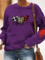 Purple fleece sweatshirt featuring cute heart prints, sleeve patch, and comfortable round neck design. - Light Purple