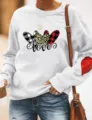 Dames casual sweatshirt met lange mouwen en ronde hals, hartjesprint en LOVE afbeelding. - S / Tops / Wit