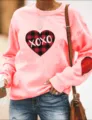Sweat-shirt rose à manches longues avec motif de cœur à carreaux écossais et détail XOXO. - Rose