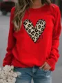 Red crewneck long sleeve sweatshirt featuring leopard heart graphic for casual wear. - S / Tops / Red