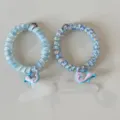 Detailed view of cute telephone wire hair ties with lovely dolphin clips, perfect for daily use. - Dopamine Telephone Cord Blue