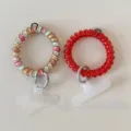 Colorful coiled phone wrist strap and mobile tether tab set for secure everyday carrying. - Dopamine Telephone Cord Red