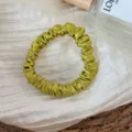 Green silk scrunchie detail view, elegant hair accessory for women and girls daily styling. - Green