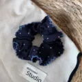 Korean dark blue polka dot hair scrunchie detail showing ruffled edges and soft fabric design. - Wave Edge Scrunchy / Navy White Polka Dot