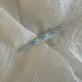 Close-up detail of a cute blue checkered hair clip decorated with tiny pearls and shells. - Ocean Series Shell Plaid Blue Alligator Clip