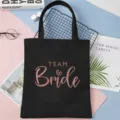 Black canvas tote bag with Team Bride print, perfect bachelorette party shoulder bag. - 35x40cm / Black Pink Gold Style 7