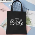 Black canvas tote bag with THE Bride letter print, perfect for bachelorette party. - 35x40cm / Black Bride Style 6