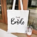 White canvas shopping tote bag featuring stylish THE Bride print for wedding bachelorette party. - 35x40cm / White Heart Style 4