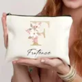 Bolsita de maquillaje personalizada con letra floral F y nombre, estuche cosmético ideal para viajes. - Estilo F