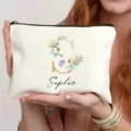 Bolsa de maquillaje de lona personalizada con letra floral S y nombre Sophie, estuche cosmético. - Estilo S