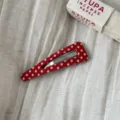 Red polka dot snap hair clip detail close-up view, cute fabric hair accessory. - Red Polka Dot - Hollow Triangle BB Clip