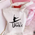 Close-up detail of white canvas tote bag featuring ballet dance girl graphic design. - Ballet Girl Print (Style 7) / 35*40cm