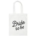 Detail shot of white canvas tote bag with black Bride to be print, stylish wedding shoulder bag. - Bride to be (Black Print) / 35*40cm