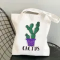 Borsa shopper in tela bianca con stampa di cactus verde, elegante borsa a spalla per uso quotidiano. - Stile Tipografia CACTUS (9)
