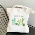 Borsa shopper in tela bianca con stampa di cactus graziosa e citazione per studenti. - Stile Slogan DON'T BE A PRICK (7)