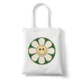 Gedetailleerd overzicht van witte canvas tas met retro groene margriet smiley patroon. - Stijl 7