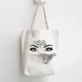 Canvas tote bag detail showing creative leopard eye graphic print design for casual daily use. - Eye Leopard Print Art Style / 35x40cm