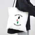 Close-up detail of a white canvas tote bag featuring political slogan and map print design. - Style 3 / 35*40cm