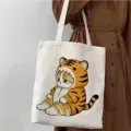 Bolso tote de lona estampada bonito, vista detallada que muestra el lindo diseño de gato y textura. - Estilo de Gato con Mameluco de Tigre