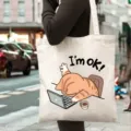 Casual canvas tote bag with cute cat print, perfect for daily commuting and student use. - Off-White Office Cat Print Style / L