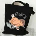 Casual black canvas tote bag with cute cat print, versatile shoulder bag for daily commuting. - Black Computer Orange Cat Print Style / L