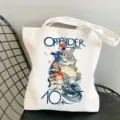 White canvas tote bag featuring classic anime characters and stylish print design. - Style 25 / 35*40cm