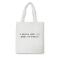 Close-up detail of white canvas tote bag featuring motivational English quote print. - Magnet Miracles Maxim Style 8 / Normal Packaging / White