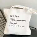 Weißer Canvas Shopper mit spanischem Zitat Print, lässige Umhängetasche für den Alltag. - L / Stil 16
