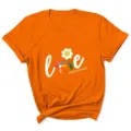 Oranje dames korte mouw t-shirt met schattige madeliefje love print en grafisch motief. - Oranje
